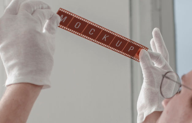 Male Photographer Holding Up Camera Film Psd