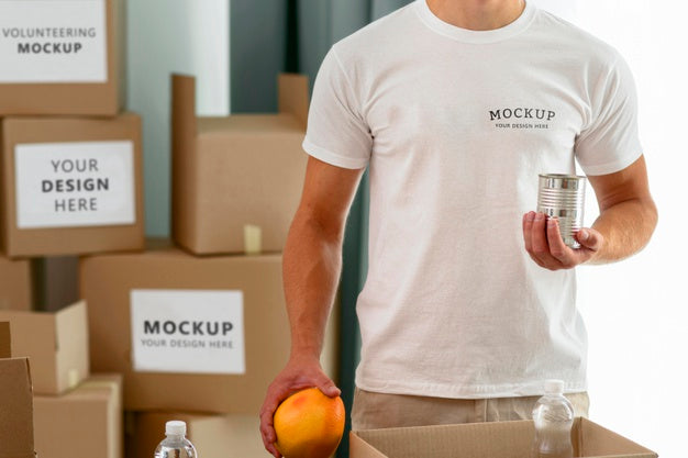 Male Volunteer Holding Provisions For Donation Psd