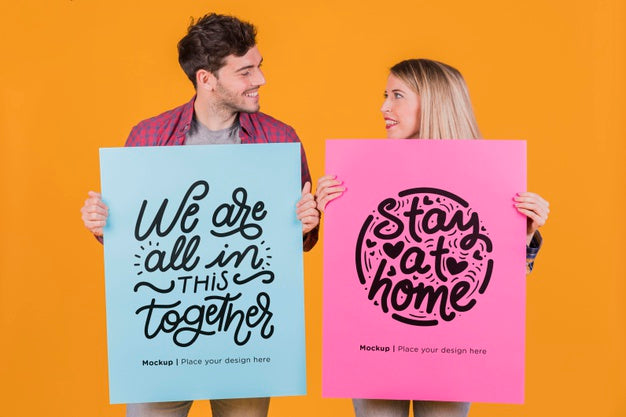 Man And Woman Holding A Sign Concept Mock-Up Psd