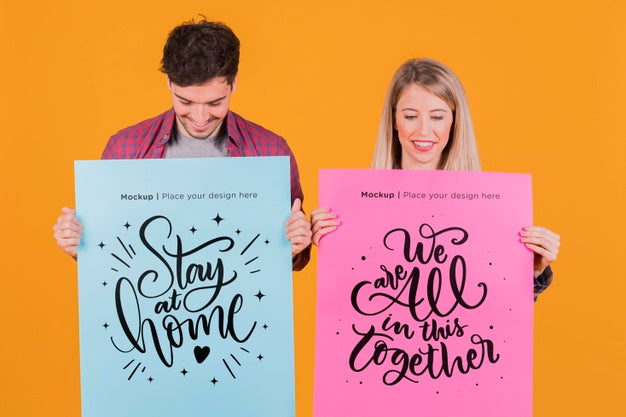 Man And Woman Holding A Sign Concept Mock-Up Psd