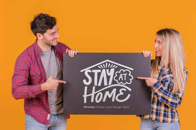 Man And Woman Holding A Sign Concept Mock-Up Psd