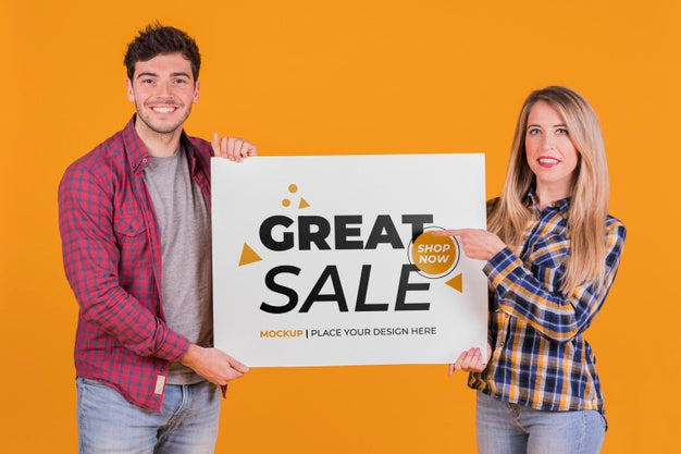 Man And Woman Holding A Sign Concept Mock-Up Psd