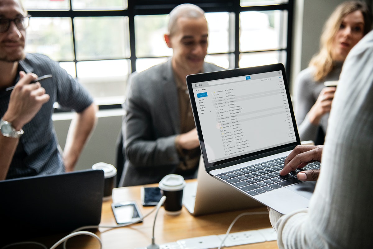 Man Checking His Email On A Laptop