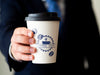 Man Holding A Coffee Cup Mock-Up Psd