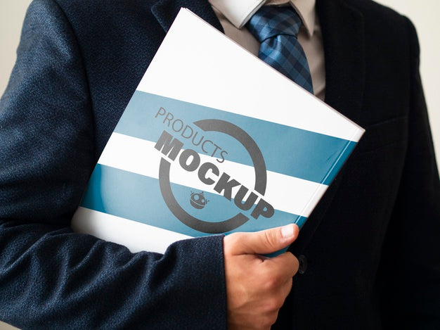 Man Holding A Notebook Mock-Up Psd
