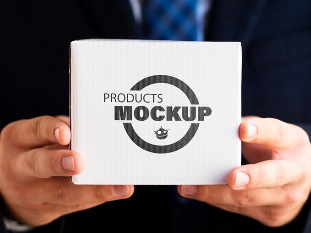 Man Holding A White Cardboard Psd