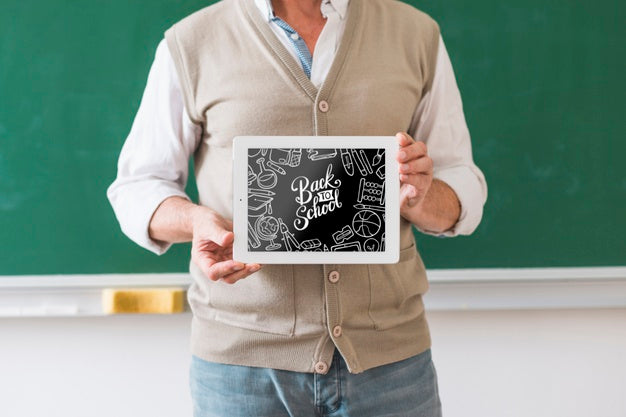 Man Holding Back To School Frame Mock-Up Psd