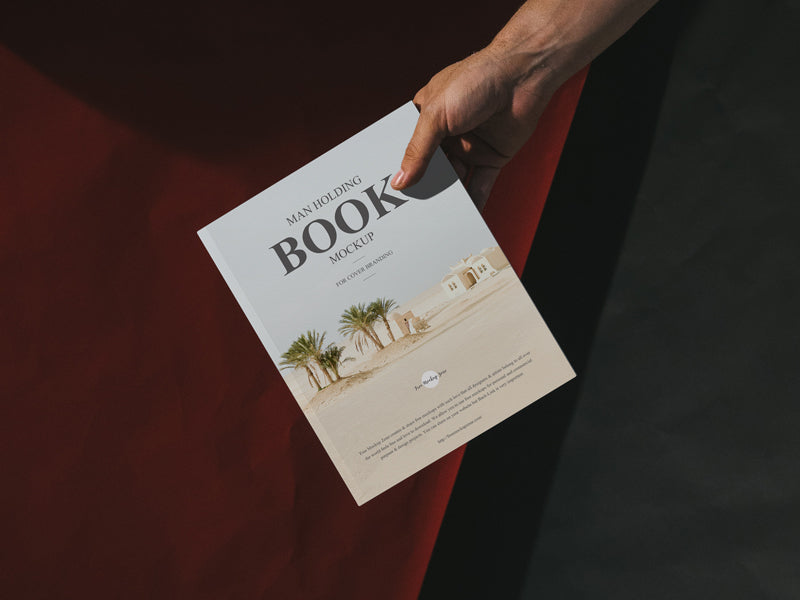 Man Holding Book Mockup For Cover Branding