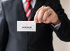Man Holding Business Card Mock-Up With One Hand Psd