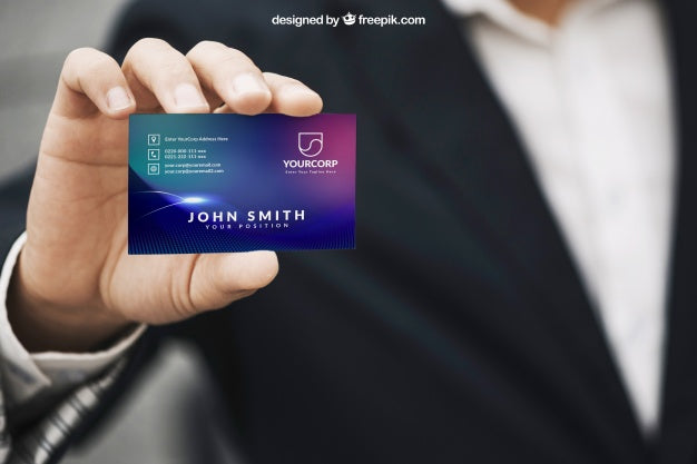 Business Man Holding a Business Card Mockup