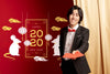 Man Holding Greeting Cards For New Year Psd