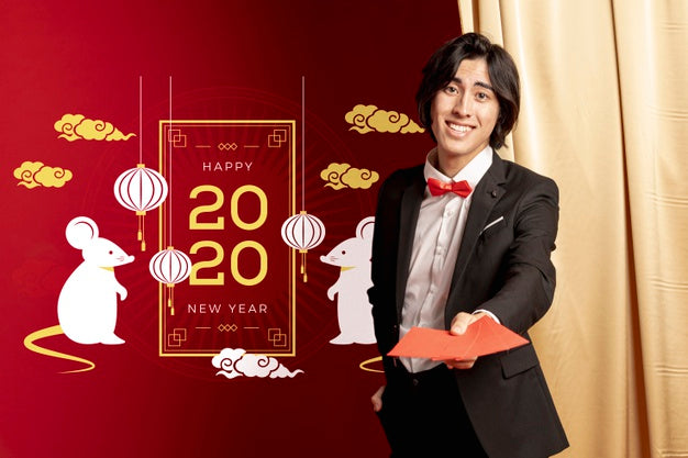 Man Holding Greeting Cards For New Year Psd