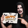Man Holding Paper With Halloween Lettering Psd