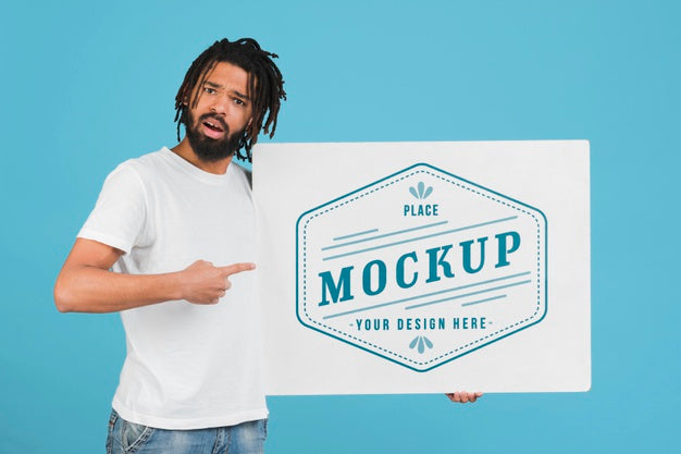 Man Holding Poster Mockup Psd