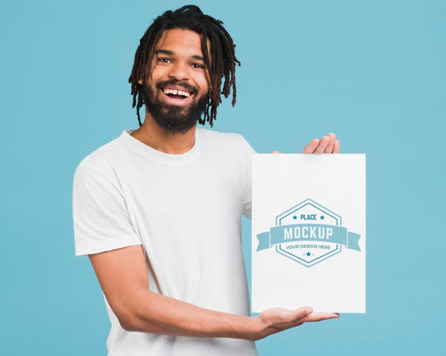 Man Holding Poster Mockup Psd