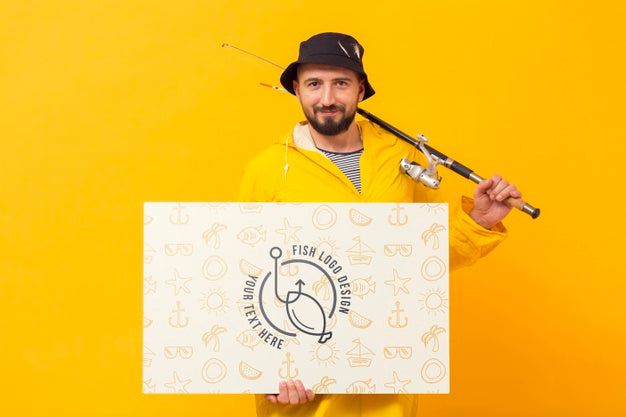 Man Holding Rod And Mock-Up Horizontal Card Psd