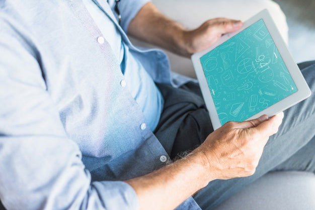 Man Holding Tablet Mockup For App Presentation Psd