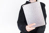 Man Holding Tablet Mockup From Behind Psd