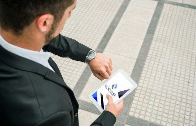 Man Holding Tablet With Mock-Up Template Psd