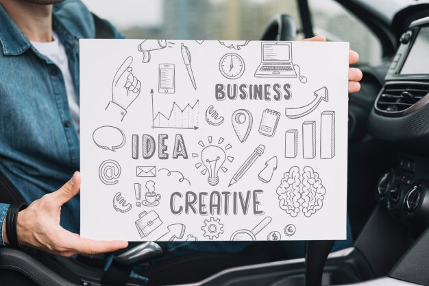 Man In Car Showing Paper Template Psd