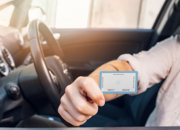 Man In Car With Business Card Mockup Psd