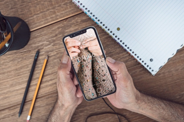 Man Looking At Smartphone Mockup Psd