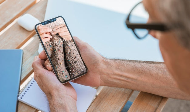 Man Looking At Smartphone Mockup Psd