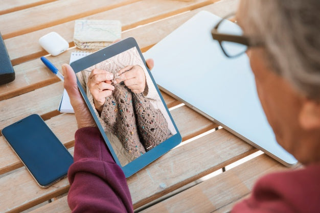 Man Looking At Tablet Mockup Psd