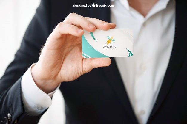 Man Presenting Business Card Mockup Psd