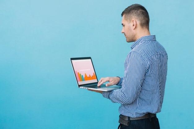 Man Presenting Laptop Mockup Psd