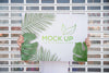 Man Presenting Poster Mockup In Front Of Gate Psd