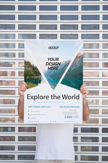 Man Presenting Poster Mockup In Front Of Gate Psd