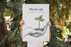 Man Presenting Poster Mockup In Front Of Park Psd