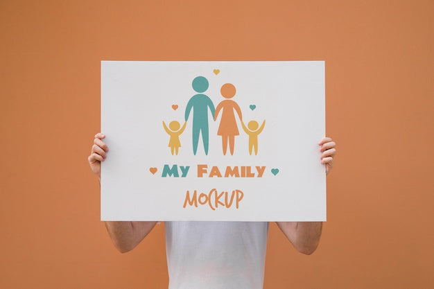 Man Presenting Poster Mockup On Orange Background Psd