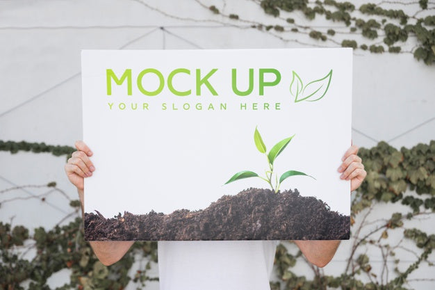 Man Presenting Poster Mockup Outdoors Psd