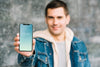 Man Presenting Smartphone Mockup Psd