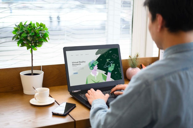 Man Typing On Laptop Keyboard Psd