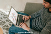 Man Using Laptop On Couch Psd