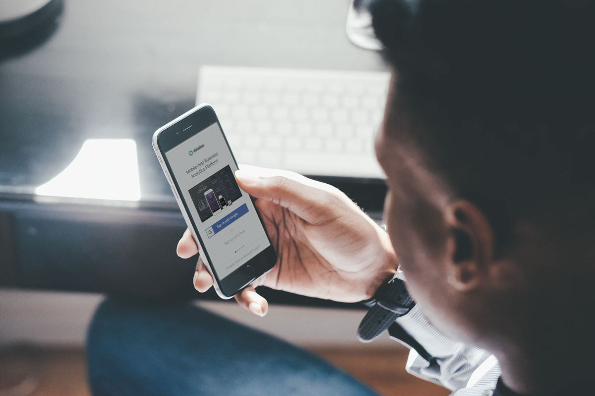 Man Viewing on Black iPhone 8 Screen PSD Mockup