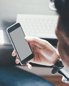 Man Viewing On Iphone Screen Mockup