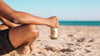 Man With Beer Bottle Mockup At The Beach Psd