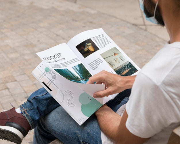 Man With Mask On Street Reading Book Psd