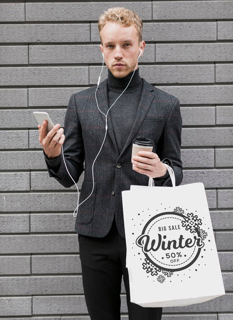 Man With Shopping Bags And Holding Mobile Psd