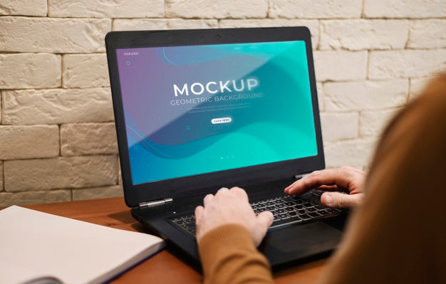 Man Working From Home While Using The Laptop Psd