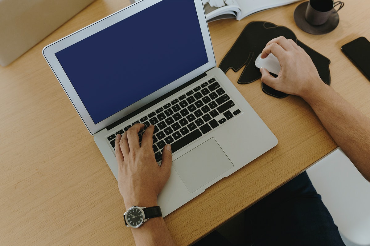 Man Working On A Laptop
