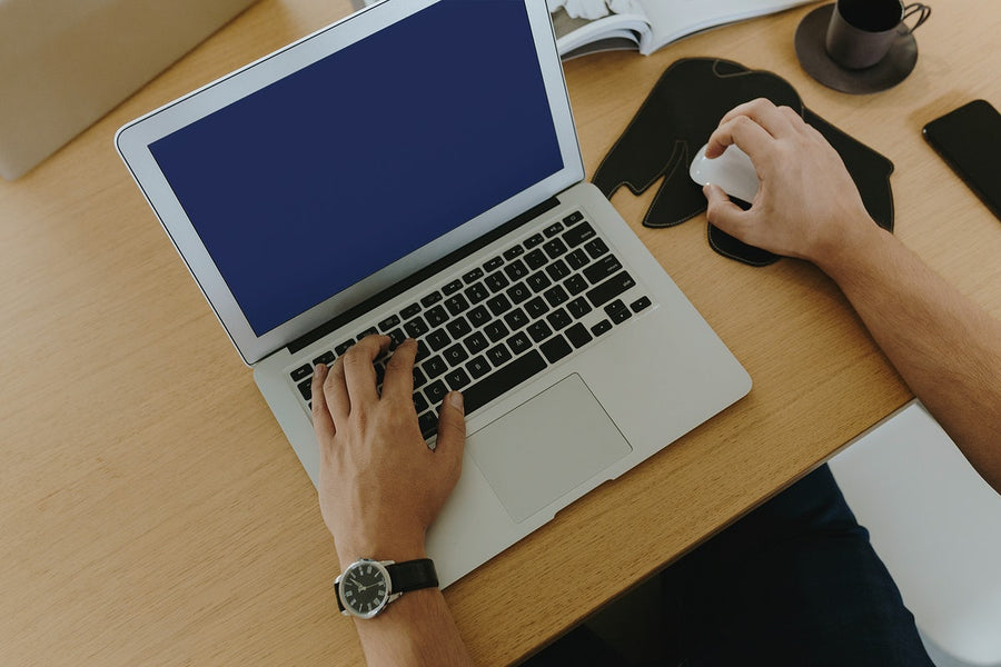 Man Working On A Laptop