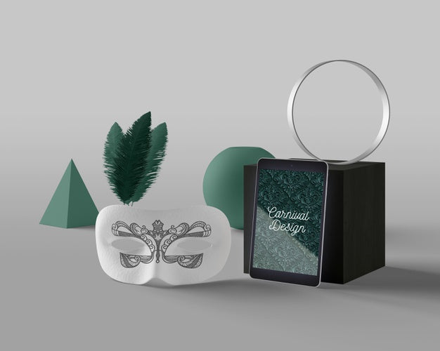 Mask Beside Tablet With Carnival Theme Psd