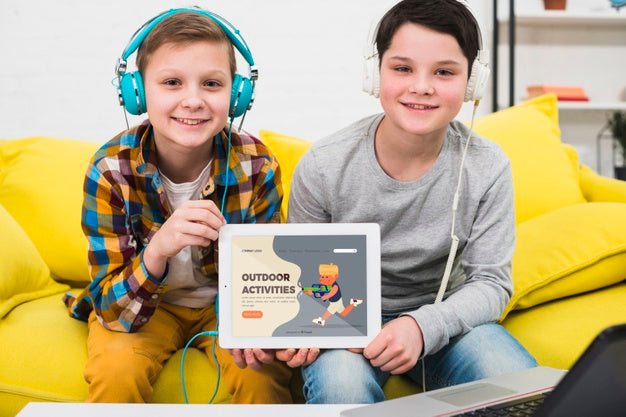 Medium Shot Boy Friendship With Tablet Psd