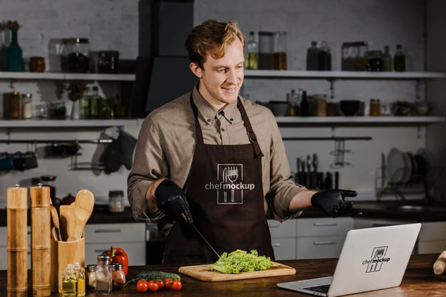 Medium Shot Chef With Laptop Psd