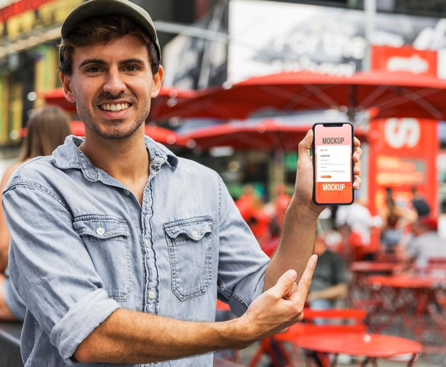 Medium Shot Man Holding Phone Psd